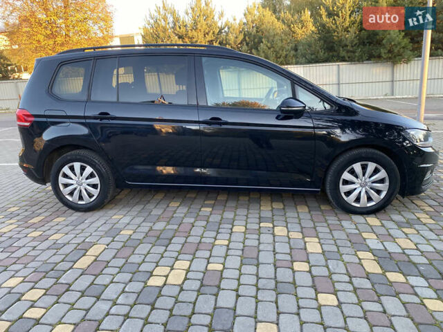 Черный Фольксваген Туран, объемом двигателя 2 л и пробегом 183 тыс. км за 16999 $, фото 1 на Automoto.ua