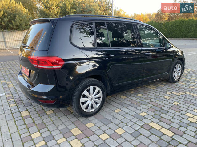 Черный Фольксваген Туран, объемом двигателя 2 л и пробегом 183 тыс. км за 16999 $, фото 2 на Automoto.ua