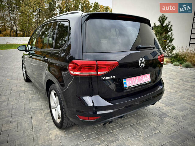 Черный Фольксваген Туран, объемом двигателя 1.97 л и пробегом 225 тыс. км за 17950 $, фото 2 на Automoto.ua
