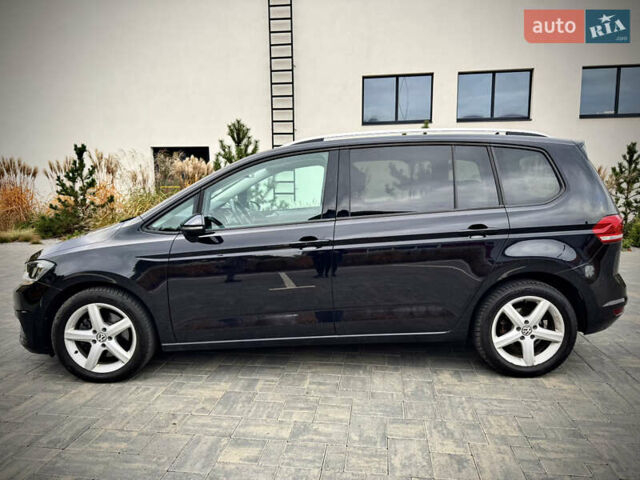 Черный Фольксваген Туран, объемом двигателя 1.97 л и пробегом 225 тыс. км за 17950 $, фото 1 на Automoto.ua