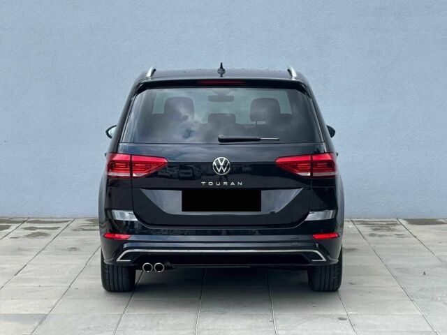 Чорний Фольксваген Туран, об'ємом двигуна 2 л та пробігом 15 тис. км за 10000 $, фото 4 на Automoto.ua