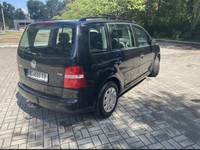 Черный Фольксваген Туран, объемом двигателя 1.6 л и пробегом 256 тыс. км за 4700 $, фото 4 на Automoto.ua