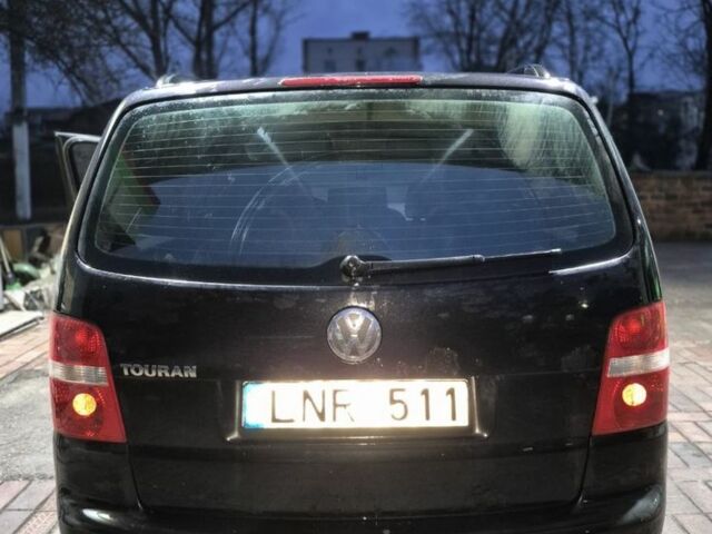 Черный Фольксваген Туран, объемом двигателя 1.9 л и пробегом 495 тыс. км за 2750 $, фото 4 на Automoto.ua