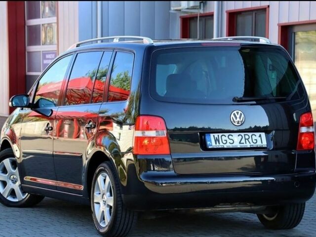 Черный Фольксваген Туран, объемом двигателя 1.9 л и пробегом 266 тыс. км за 2650 $, фото 2 на Automoto.ua