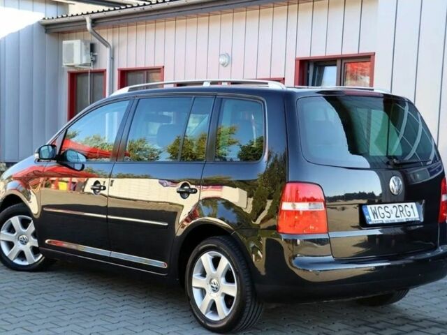 Черный Фольксваген Туран, объемом двигателя 1.9 л и пробегом 266 тыс. км за 2650 $, фото 3 на Automoto.ua