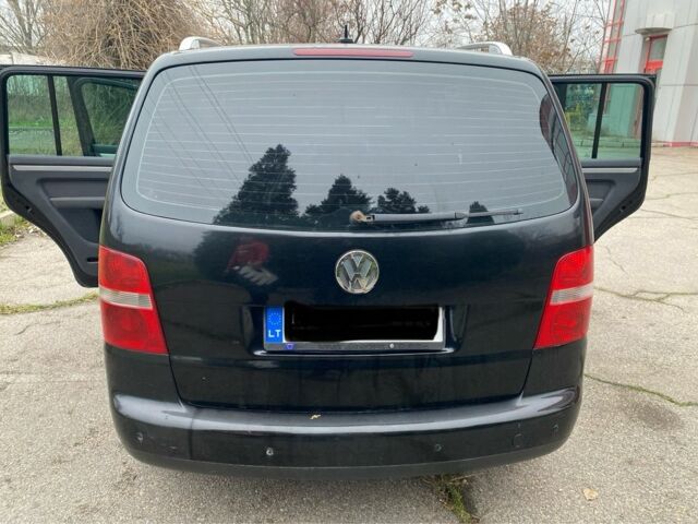 Чорний Фольксваген Туран, об'ємом двигуна 2 л та пробігом 383 тис. км за 3500 $, фото 1 на Automoto.ua