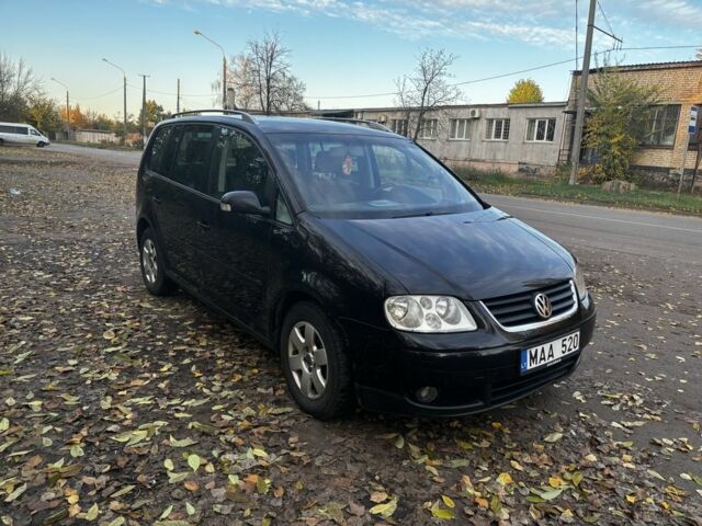 Чорний Фольксваген Туран, об'ємом двигуна 2 л та пробігом 245 тис. км за 3700 $, фото 2 на Automoto.ua