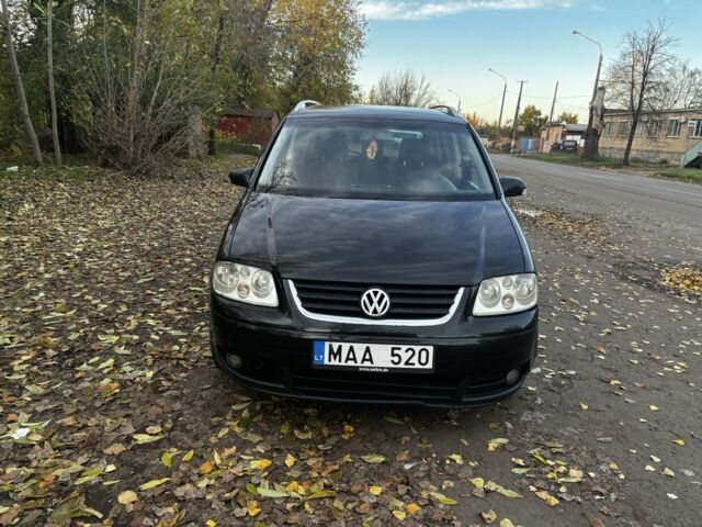 Чорний Фольксваген Туран, об'ємом двигуна 2 л та пробігом 245 тис. км за 3700 $, фото 1 на Automoto.ua