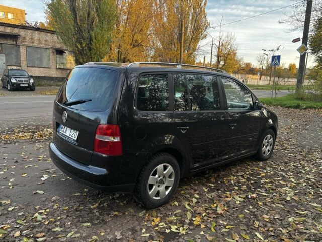 Чорний Фольксваген Туран, об'ємом двигуна 2 л та пробігом 245 тис. км за 3700 $, фото 4 на Automoto.ua