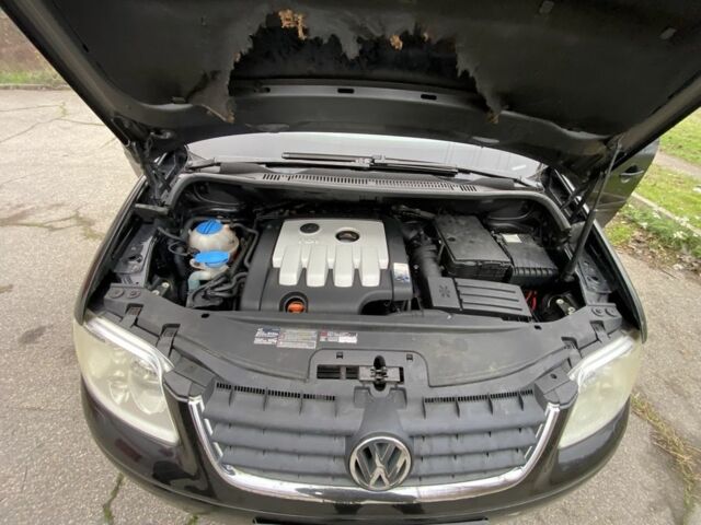 Чорний Фольксваген Туран, об'ємом двигуна 2 л та пробігом 383 тис. км за 3500 $, фото 2 на Automoto.ua