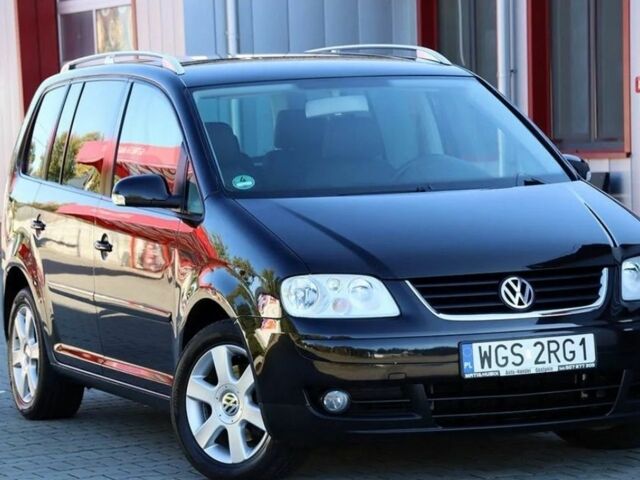 Черный Фольксваген Туран, объемом двигателя 1.9 л и пробегом 266 тыс. км за 2650 $, фото 1 на Automoto.ua