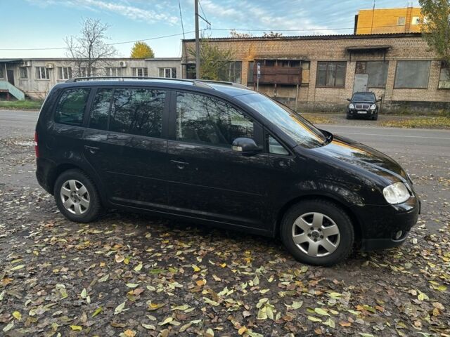 Чорний Фольксваген Туран, об'ємом двигуна 2 л та пробігом 245 тис. км за 3700 $, фото 3 на Automoto.ua