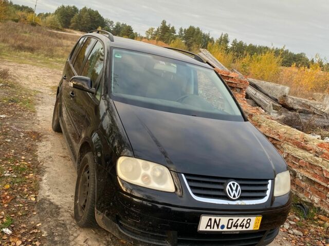 Черный Фольксваген Туран, объемом двигателя 1.9 л и пробегом 270 тыс. км за 2450 $, фото 1 на Automoto.ua