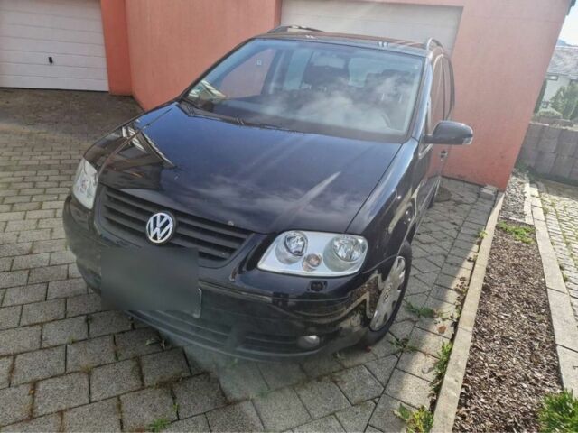 Чорний Фольксваген Туран, об'ємом двигуна 2 л та пробігом 280 тис. км за 3009 $, фото 1 на Automoto.ua