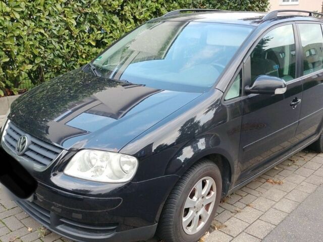 Черный Фольксваген Туран, объемом двигателя 1.6 л и пробегом 200 тыс. км за 4850 $, фото 5 на Automoto.ua