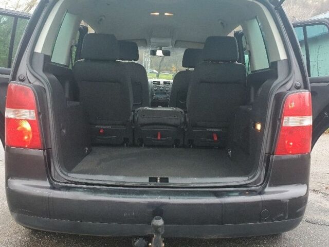 Черный Фольксваген Туран, объемом двигателя 1.9 л и пробегом 333 тыс. км за 3300 $, фото 11 на Automoto.ua