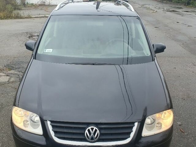 Черный Фольксваген Туран, объемом двигателя 1.9 л и пробегом 333 тыс. км за 3300 $, фото 4 на Automoto.ua