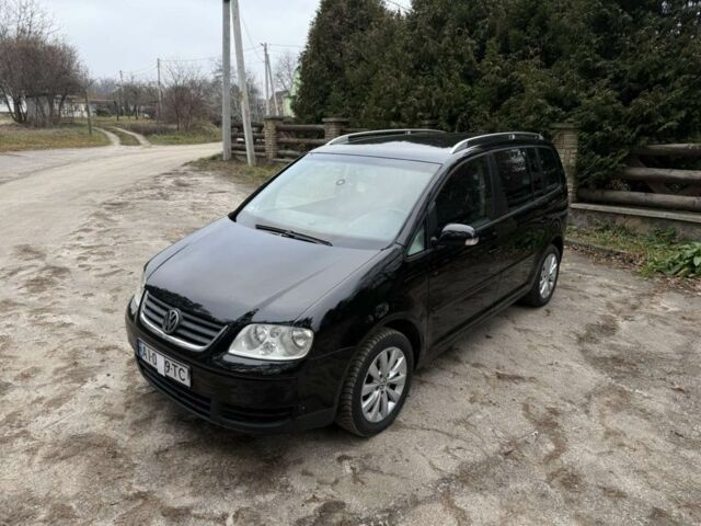 Чорний Фольксваген Туран, об'ємом двигуна 2 л та пробігом 328 тис. км за 2999 $, фото 8 на Automoto.ua