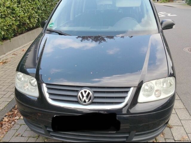 Черный Фольксваген Туран, объемом двигателя 1.6 л и пробегом 200 тыс. км за 4850 $, фото 6 на Automoto.ua