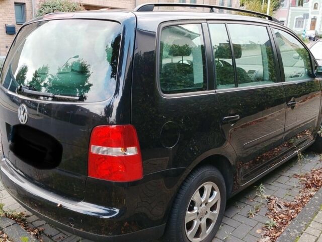 Черный Фольксваген Туран, объемом двигателя 1.6 л и пробегом 200 тыс. км за 4850 $, фото 4 на Automoto.ua