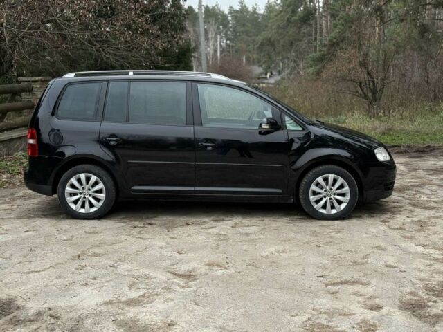 Чорний Фольксваген Туран, об'ємом двигуна 2 л та пробігом 328 тис. км за 2999 $, фото 3 на Automoto.ua