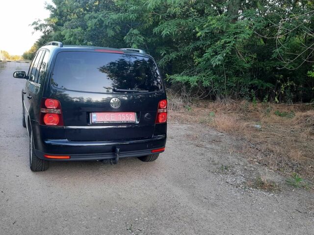 Черный Фольксваген Туран, объемом двигателя 1.6 л и пробегом 138 тыс. км за 7175 $, фото 4 на Automoto.ua