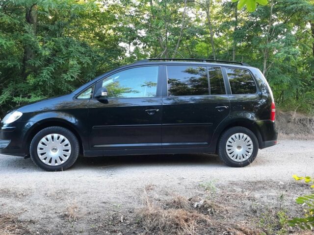 Черный Фольксваген Туран, объемом двигателя 1.6 л и пробегом 138 тыс. км за 7175 $, фото 5 на Automoto.ua