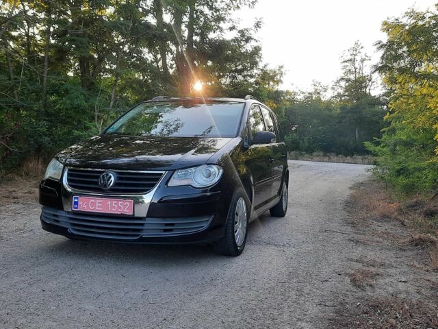 Черный Фольксваген Туран, объемом двигателя 1.6 л и пробегом 138 тыс. км за 7175 $, фото 6 на Automoto.ua