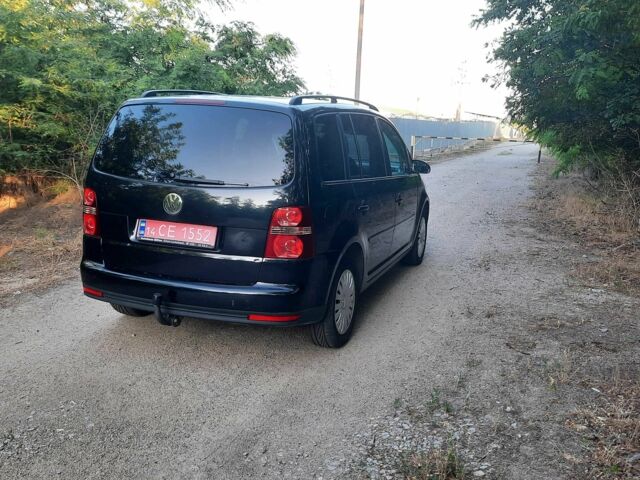 Черный Фольксваген Туран, объемом двигателя 1.6 л и пробегом 138 тыс. км за 7175 $, фото 3 на Automoto.ua