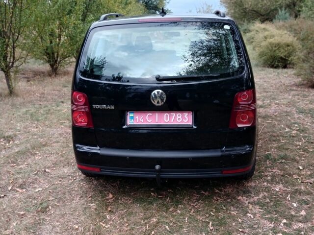 Черный Фольксваген Туран, объемом двигателя 1.6 л и пробегом 248 тыс. км за 8299 $, фото 7 на Automoto.ua