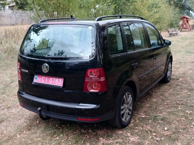 Черный Фольксваген Туран, объемом двигателя 1.6 л и пробегом 248 тыс. км за 8299 $, фото 6 на Automoto.ua