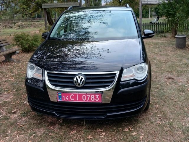 Черный Фольксваген Туран, объемом двигателя 1.6 л и пробегом 248 тыс. км за 8299 $, фото 2 на Automoto.ua