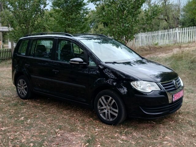 Черный Фольксваген Туран, объемом двигателя 1.6 л и пробегом 248 тыс. км за 8299 $, фото 5 на Automoto.ua