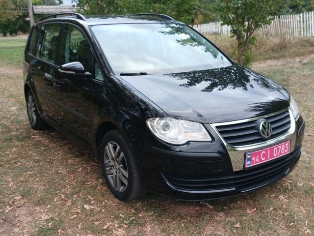 Черный Фольксваген Туран, объемом двигателя 1.6 л и пробегом 248 тыс. км за 8299 $, фото 4 на Automoto.ua