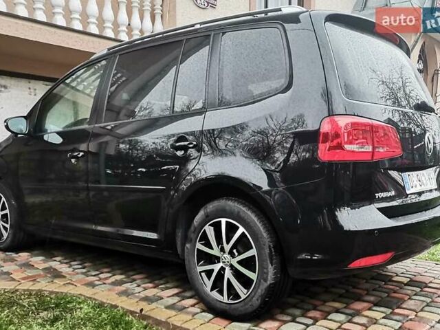 Черный Фольксваген Туран, объемом двигателя 1.6 л и пробегом 211 тыс. км за 12950 $, фото 3 на Automoto.ua
