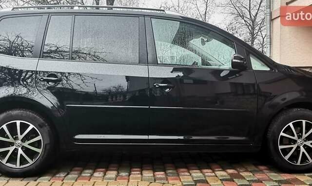 Черный Фольксваген Туран, объемом двигателя 1.6 л и пробегом 211 тыс. км за 12950 $, фото 7 на Automoto.ua