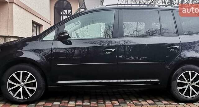 Черный Фольксваген Туран, объемом двигателя 1.6 л и пробегом 211 тыс. км за 12950 $, фото 2 на Automoto.ua