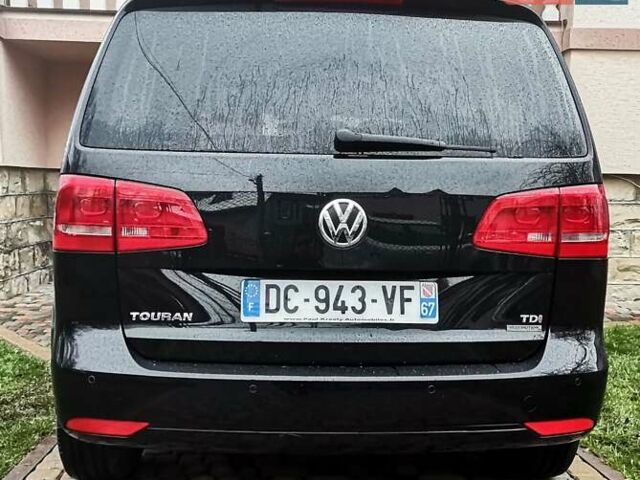 Черный Фольксваген Туран, объемом двигателя 1.6 л и пробегом 211 тыс. км за 12950 $, фото 4 на Automoto.ua