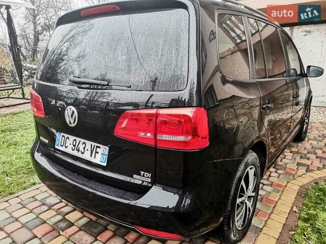 Черный Фольксваген Туран, объемом двигателя 1.6 л и пробегом 211 тыс. км за 12950 $, фото 5 на Automoto.ua