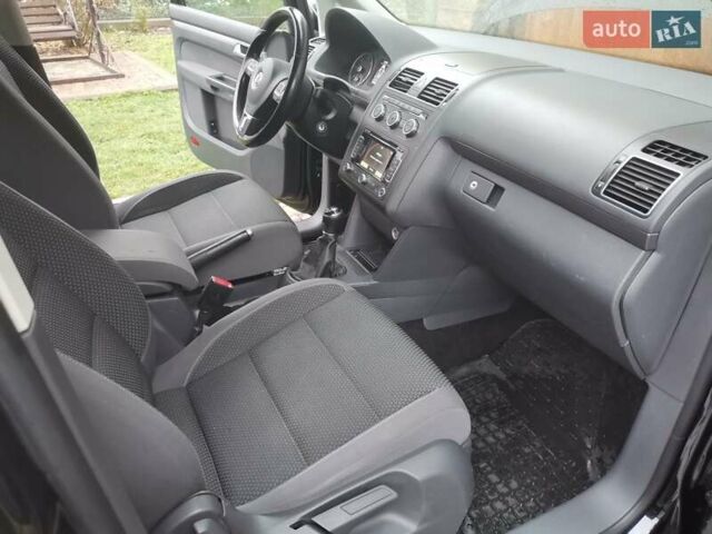 Черный Фольксваген Туран, объемом двигателя 1.6 л и пробегом 211 тыс. км за 12950 $, фото 14 на Automoto.ua