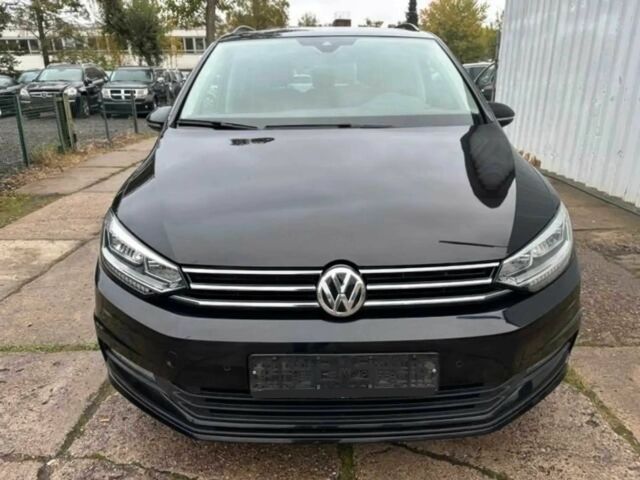 Черный Фольксваген Туран, объемом двигателя 1.4 л и пробегом 72 тыс. км за 5600 $, фото 1 на Automoto.ua