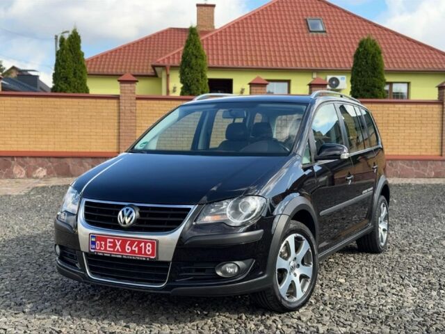 Черный Фольксваген Туран, объемом двигателя 1.4 л и пробегом 220 тыс. км за 7500 $, фото 1 на Automoto.ua