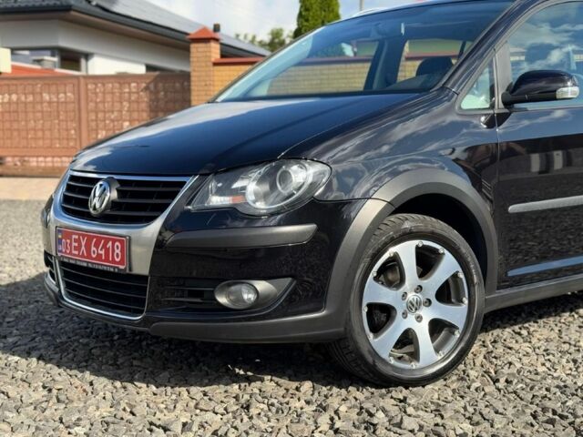 Черный Фольксваген Туран, объемом двигателя 1.4 л и пробегом 220 тыс. км за 7500 $, фото 7 на Automoto.ua