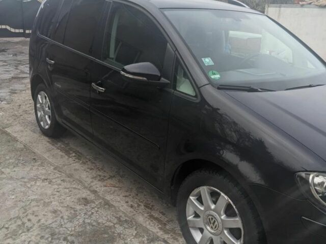 Черный Фольксваген Туран, объемом двигателя 0 л и пробегом 257 тыс. км за 7825 $, фото 2 на Automoto.ua