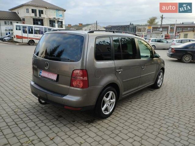 Коричневий Фольксваген Туран, об'ємом двигуна 1.4 л та пробігом 246 тис. км за 5600 $, фото 4 на Automoto.ua