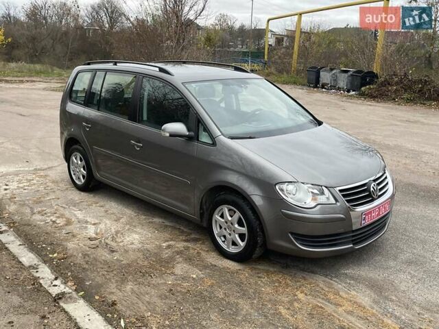 Коричневий Фольксваген Туран, об'ємом двигуна 1.4 л та пробігом 190 тис. км за 7333 $, фото 183 на Automoto.ua