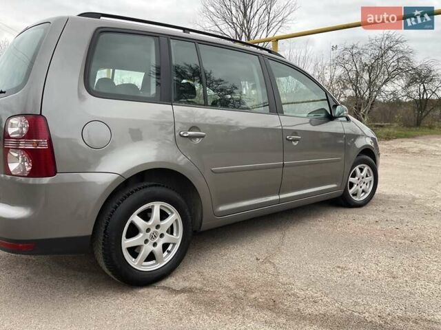 Коричневий Фольксваген Туран, об'ємом двигуна 1.4 л та пробігом 190 тис. км за 7333 $, фото 97 на Automoto.ua