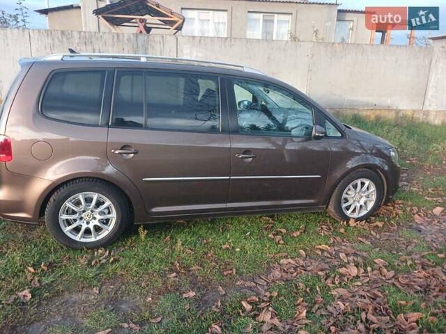 Коричневый Фольксваген Туран, объемом двигателя 1.4 л и пробегом 216 тыс. км за 9700 $, фото 1 на Automoto.ua
