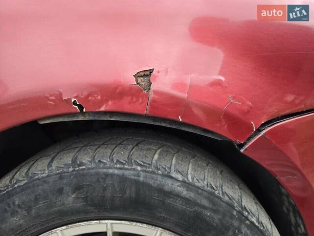 Червоний Фольксваген Туран, об'ємом двигуна 1.97 л та пробігом 387 тис. км за 4900 $, фото 19 на Automoto.ua