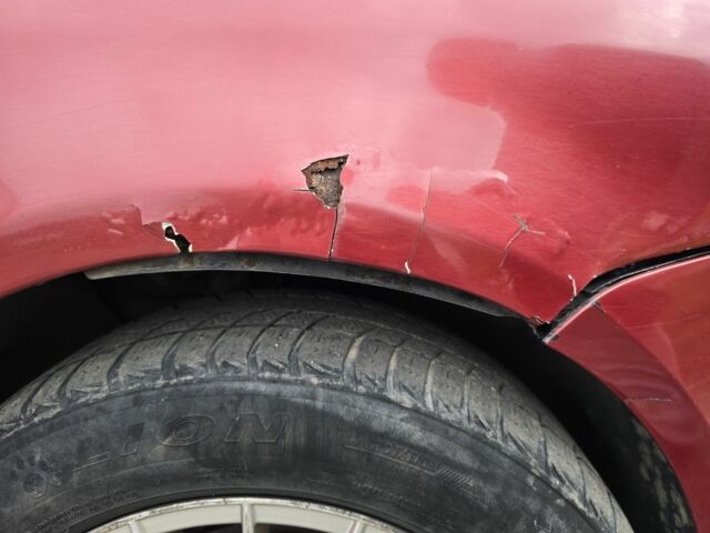 Красный Фольксваген Туран, объемом двигателя 2 л и пробегом 378 тыс. км за 4800 $, фото 9 на Automoto.ua